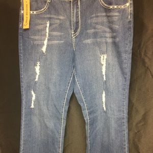 Plus size women distressed denim jeans